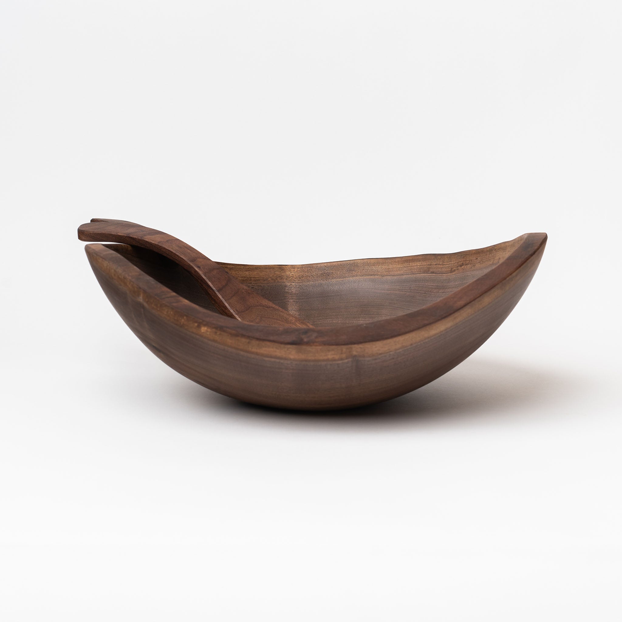 Spencer peterman black walnut salad tossers in a black walnut bowl on a white background