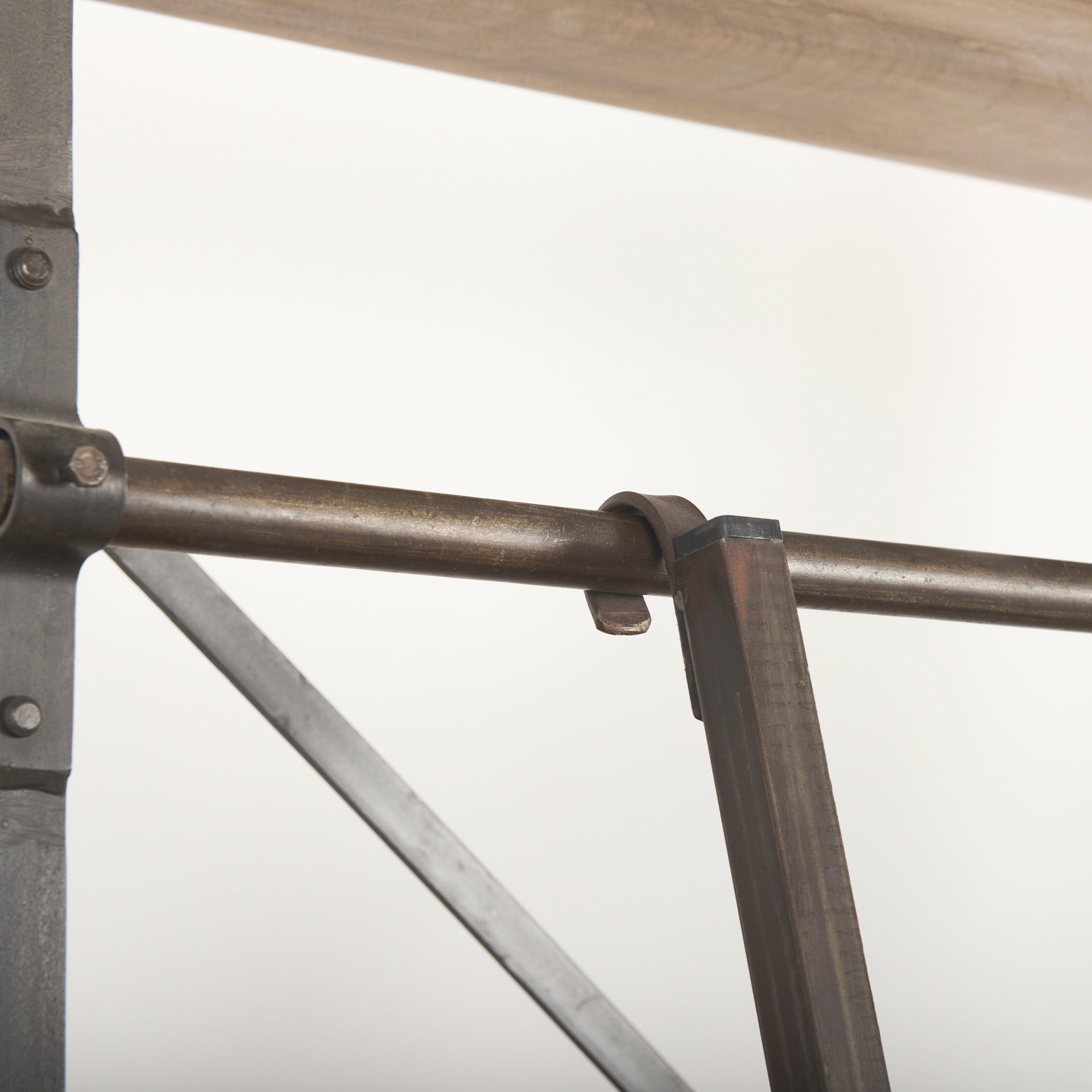 Close up of Brodie II Medium Brown Wood Copper Ladder Four Shelf Shelving Unit on a white background