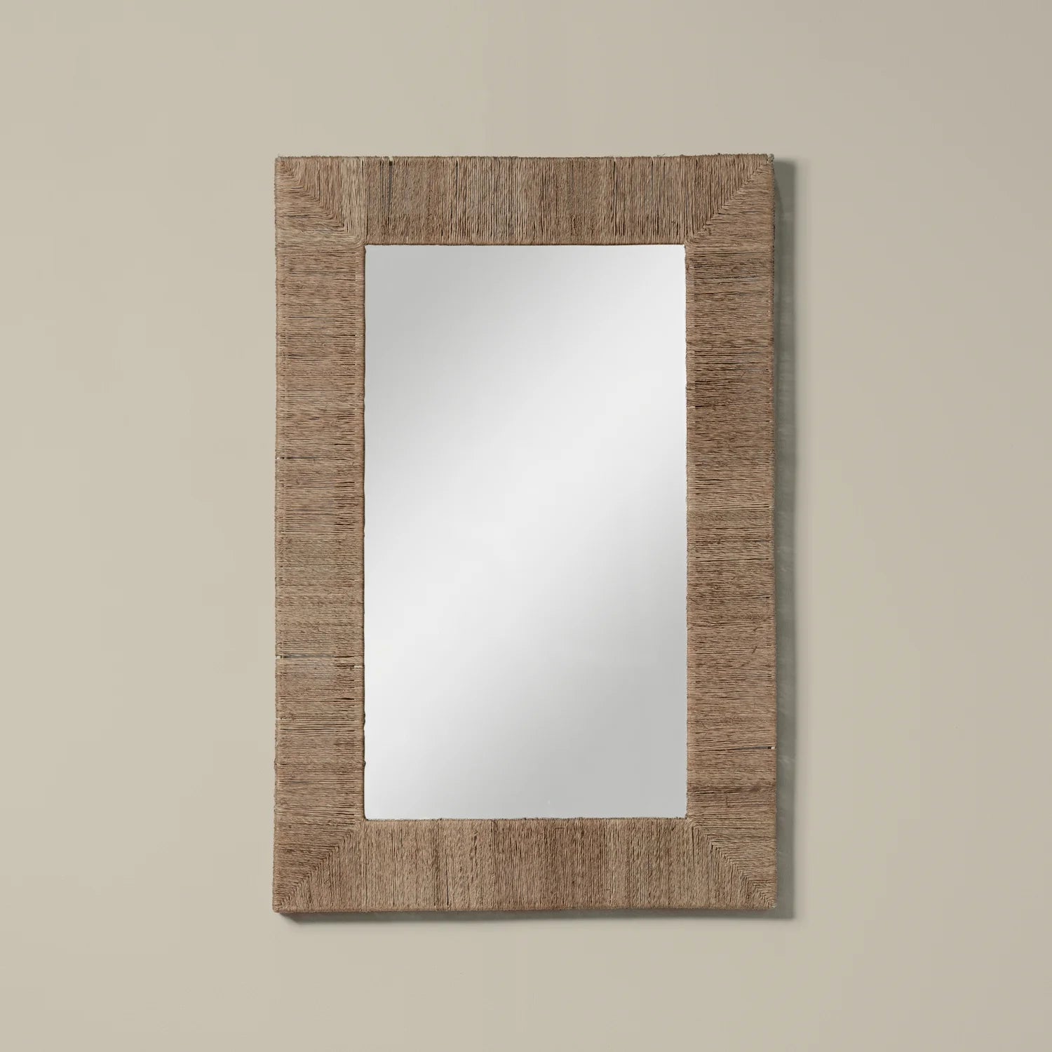 Highball Jute Rectangular Mirror on a beige background