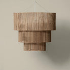 Woven brand 3 Tier Jute Chandelier on a beige background