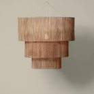 3 Tier Jute Chandelier on a beige background