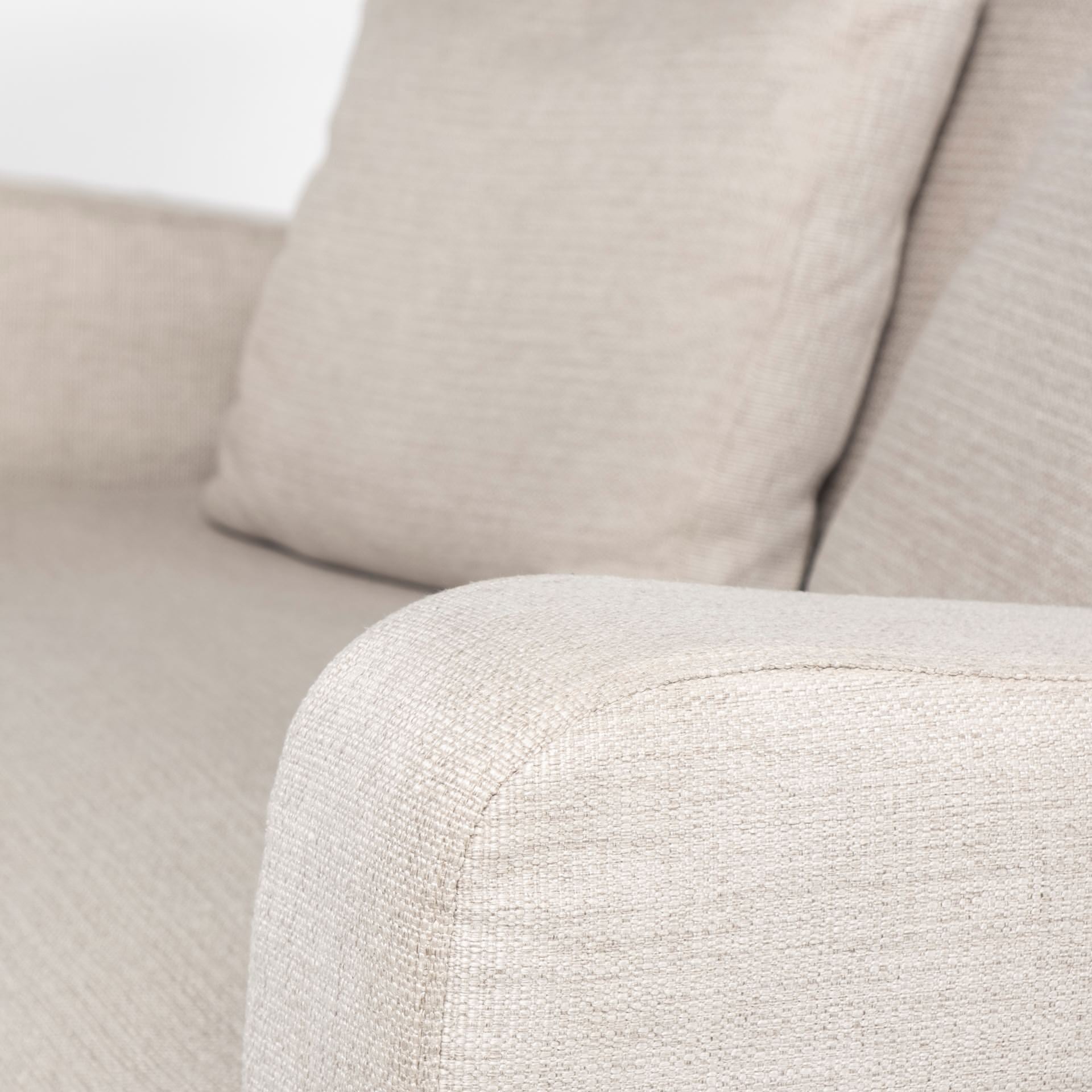 Close up of Denly I 69 X 38.25 X 34.5 Beige Slipcover Two Seater Sofa on a white background