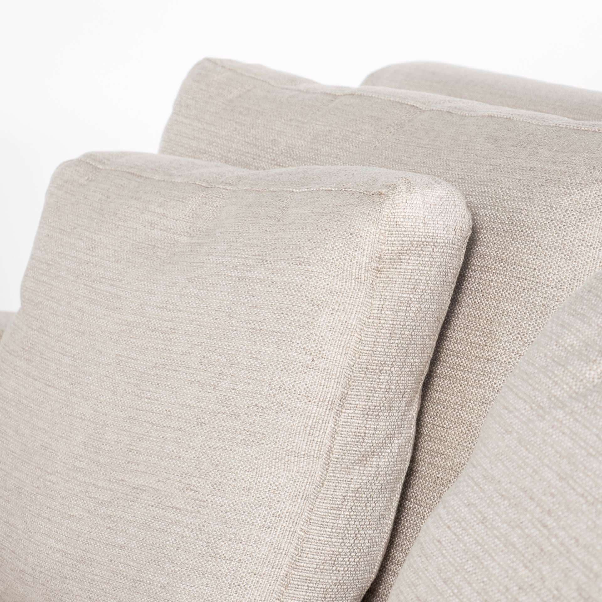 Close up of Denly I 69 X 38.25 X 34.5 Beige Slipcover Two Seater Sofa on a white background