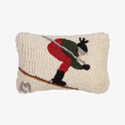 Small hand hooked pillow with image of downhill skier on a white background