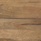 Close up of wood top of nesting gunmetal drum coffee table.