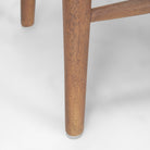 Ernest Medium Brown Wood Counter Stool on a white background