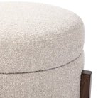 Close up of Esben Storage Ottoman in Sattley Fog on a white background