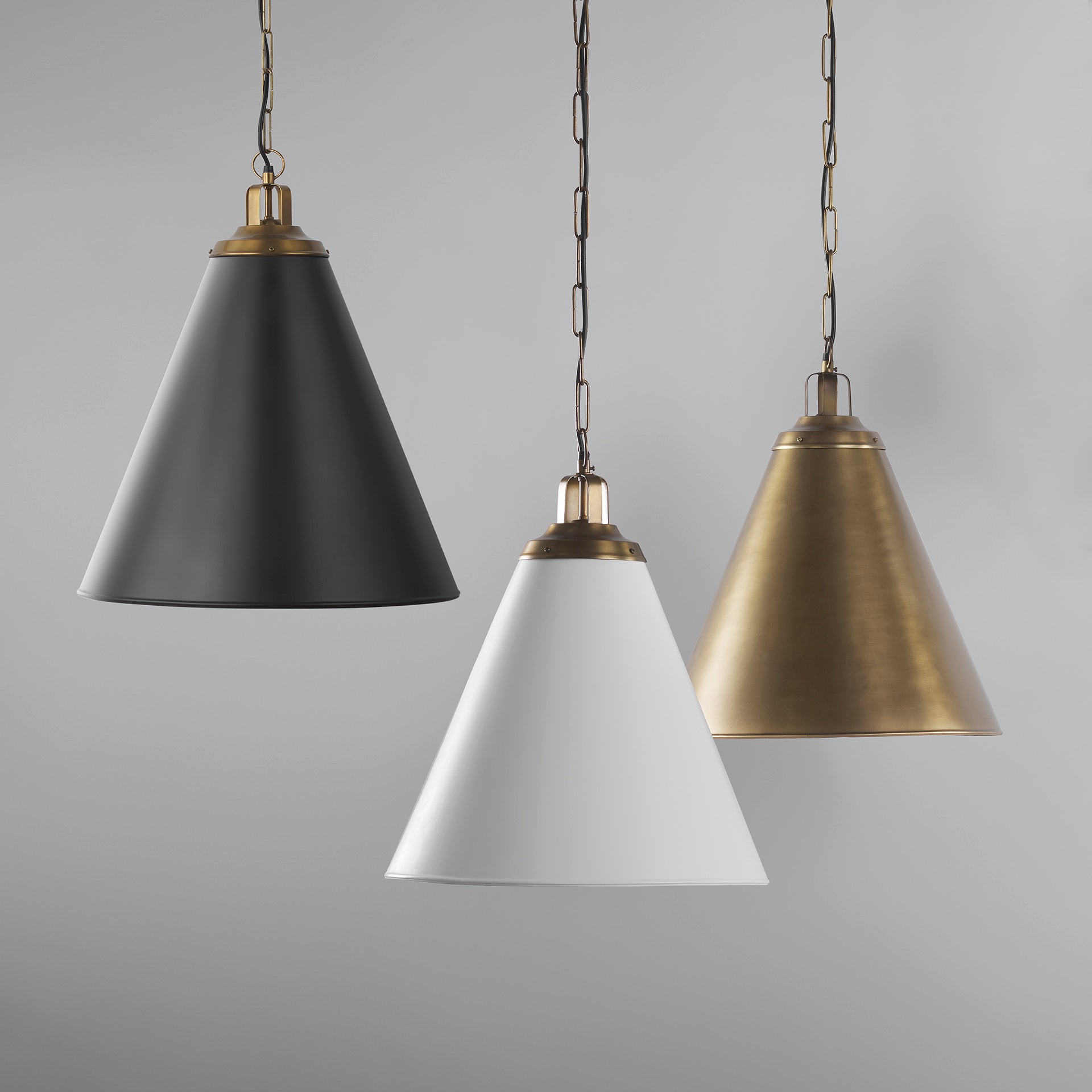 Fenton Antiqued Pendant Lights on a grey background