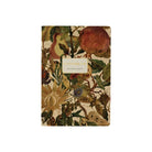 Notebook with muted fig and pomegranate pattern on the front on a white background