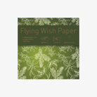 Holiday Green Flying Wish Paper on a white background