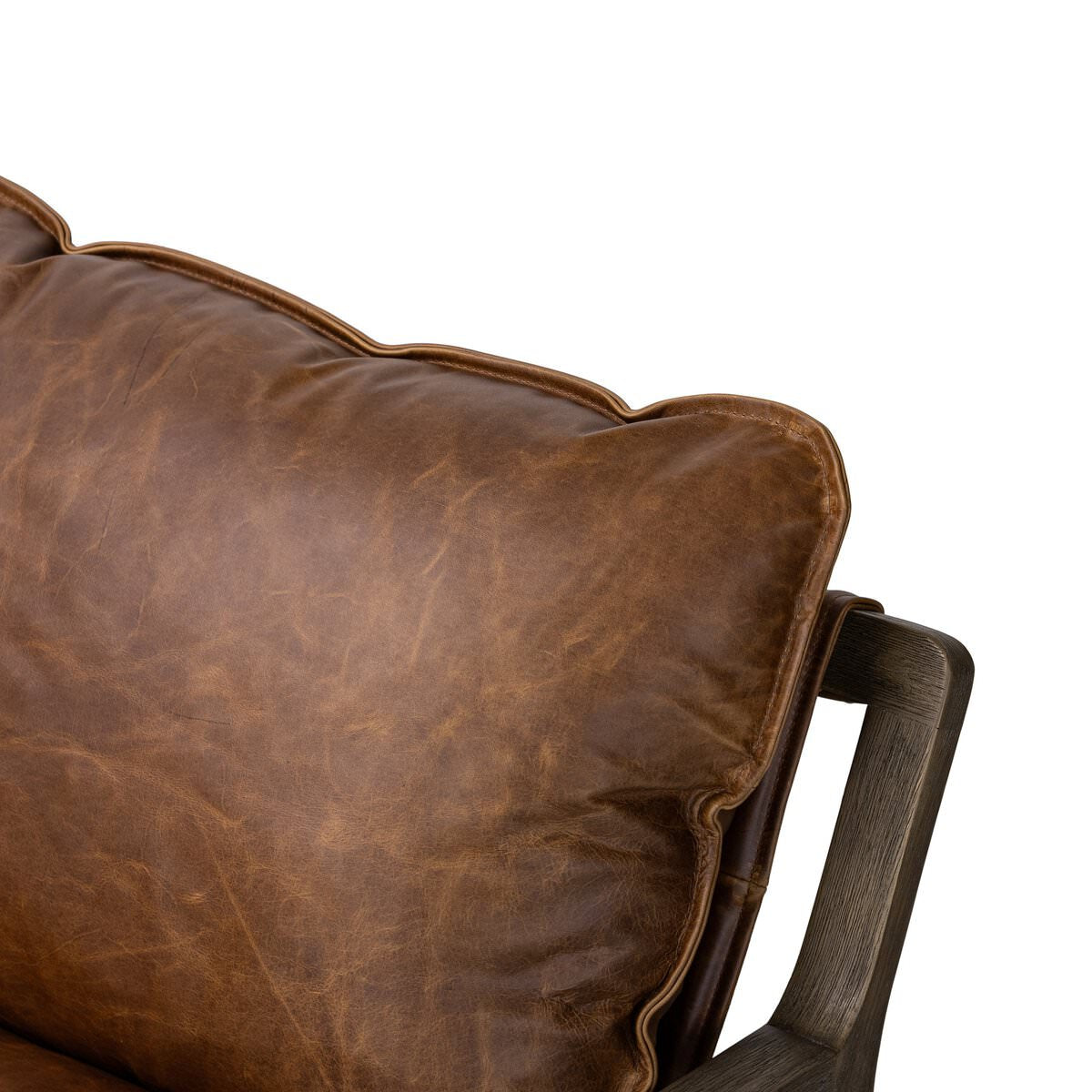 Close up of Four Hands Ace Chair in Raleigh Chestnut on a white background