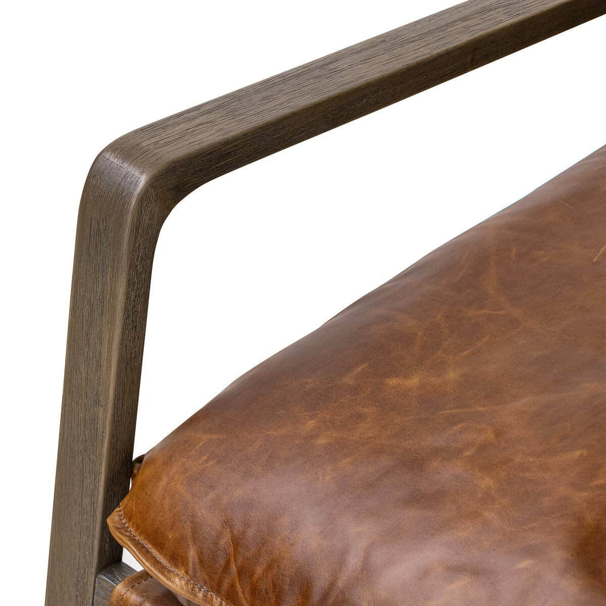 Close up of Four Hands Ace Chair in Raleigh Chestnut on a white background