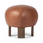 Four Hands Alma Ottoman in Brickhouse Cognac on a white background