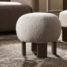 Four Hands Alma Ottoman in Somerton Ash in a neutral modern living room