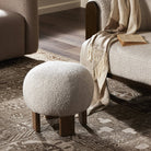 Four Hands Alma Ottoman in Somerton Ash in a neutral modern living room