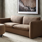 Four Hands Aniston Ottoman in Andes Toast in a modern living room