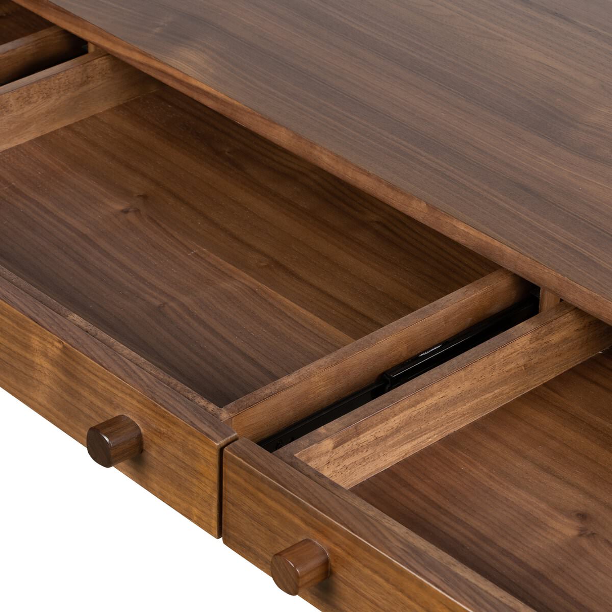 Close up of drawers of Four Hands Arturo Desk in Natural Walnut Veneer on a white background