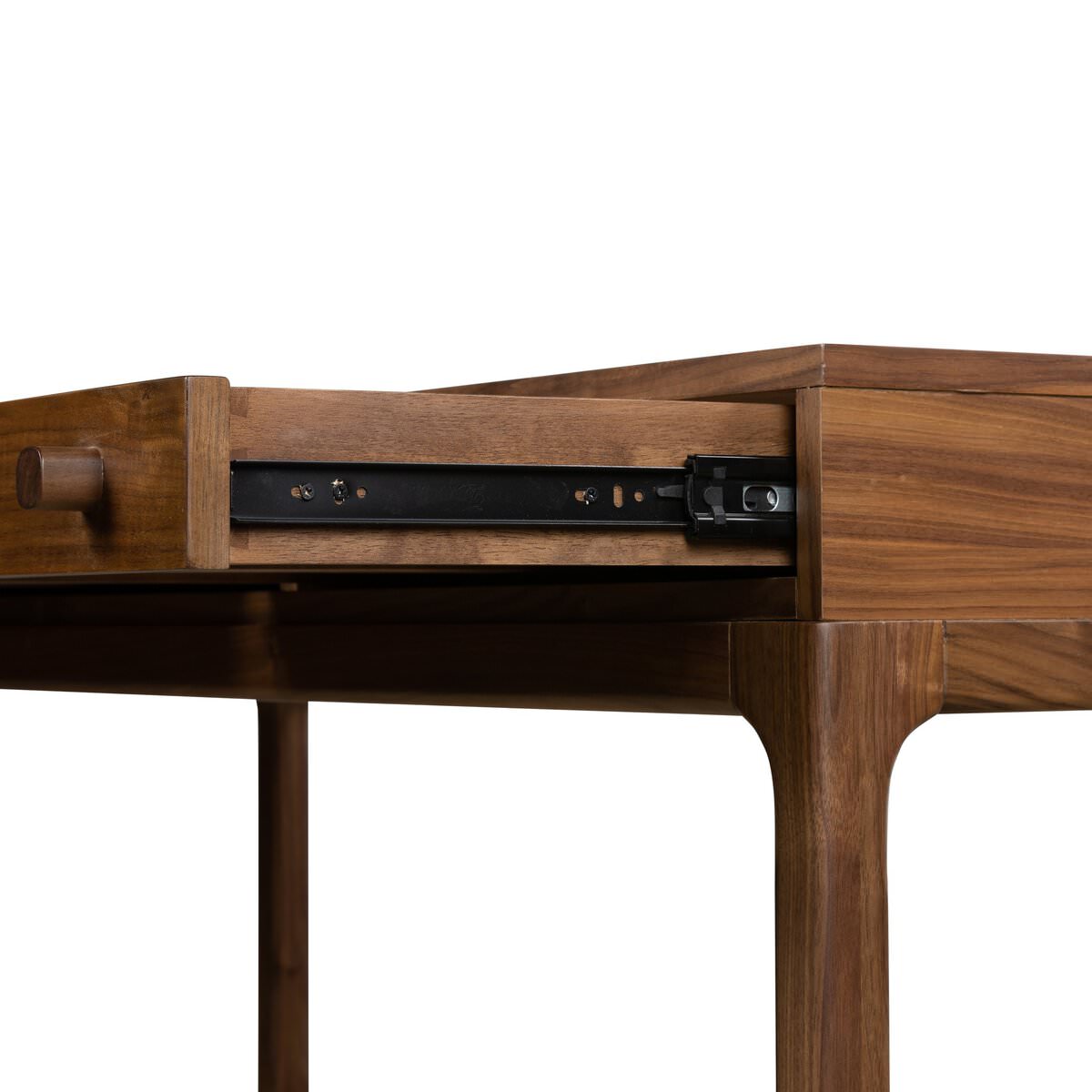 Close up of Four Hands Arturo Desk in Natural Walnut Veneer on a white background