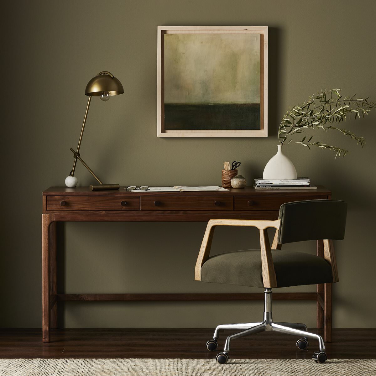 Four Hands Arturo Desk in Natural Walnut Veneer in a modern office with green walls