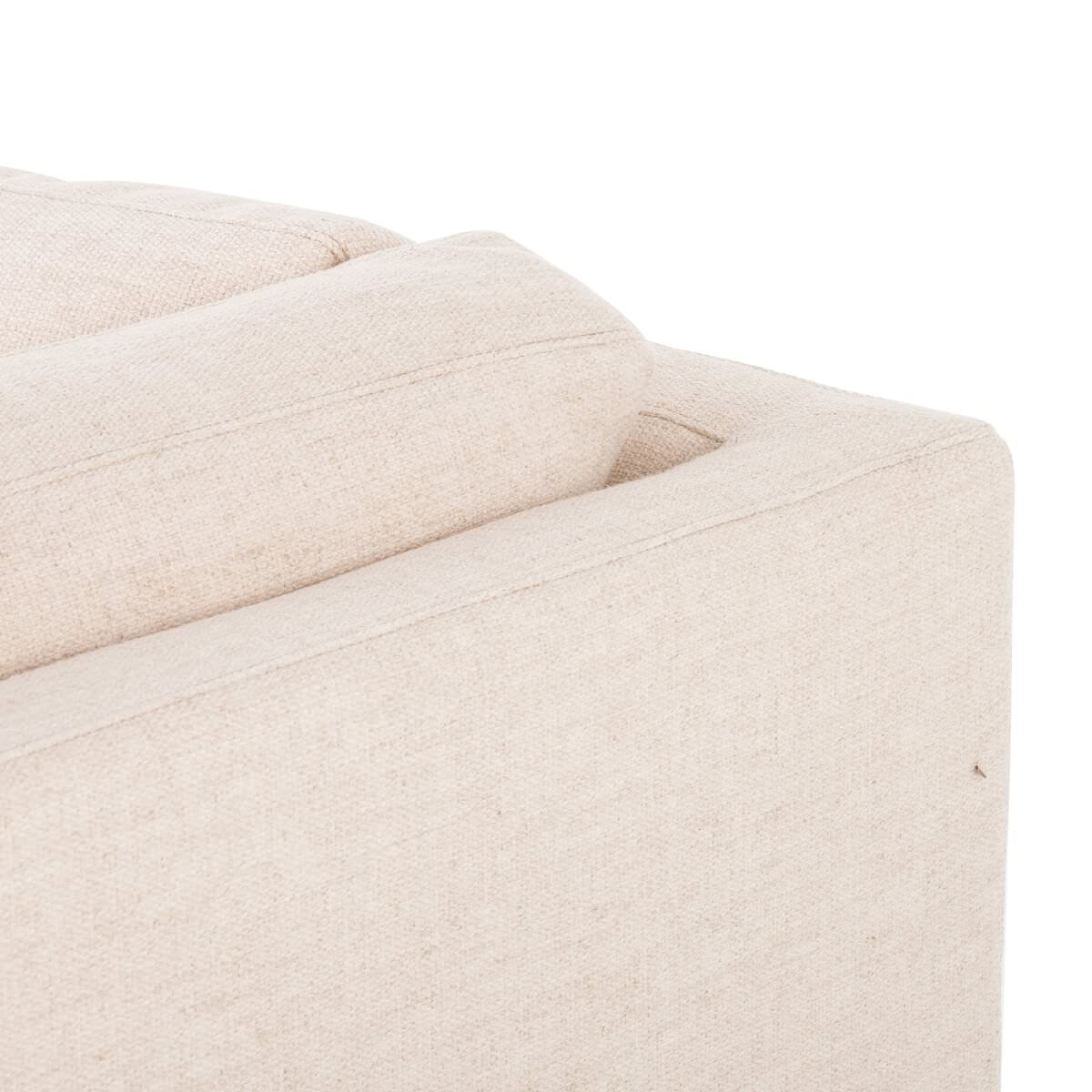 Close up of Four Hands Boone Small 3-Piece Sectional in Thames Cream on a white background