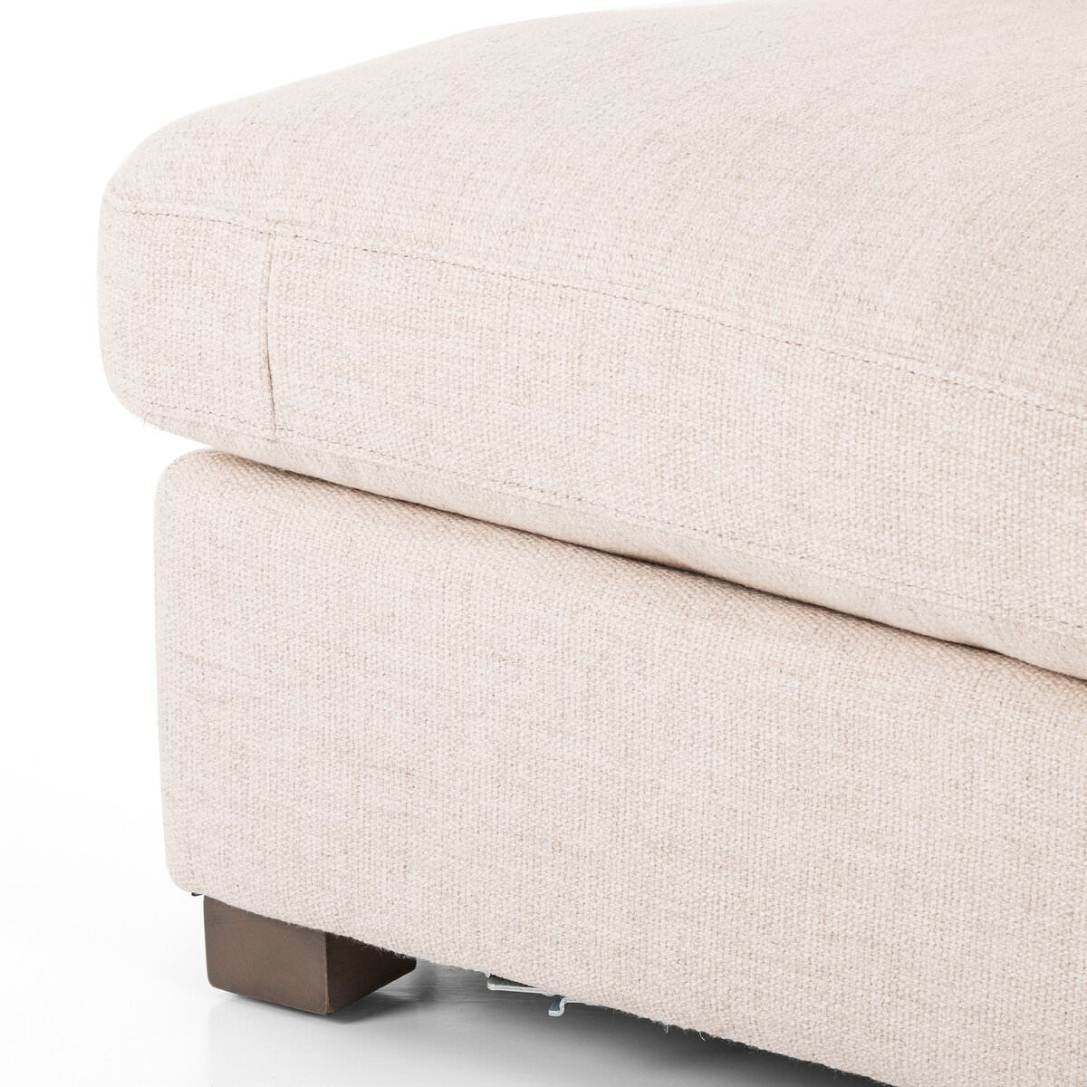 Close up of Four Hands Boone Small 3-Piece Sectional in Thames Cream on a white background