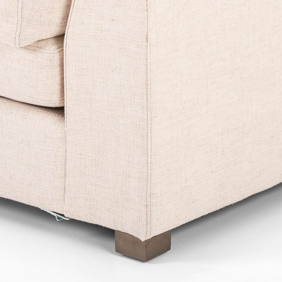 Close up of Four Hands Boone Small 3-Piece Sectional in Thames Cream on a white background