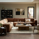 Four Hands Brinton Square Coffee Table in Rustic Oak Veneer in a modern neutral living room