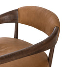 Close up of Four Hands Dane Chair in Eucapel Cognac on a white background