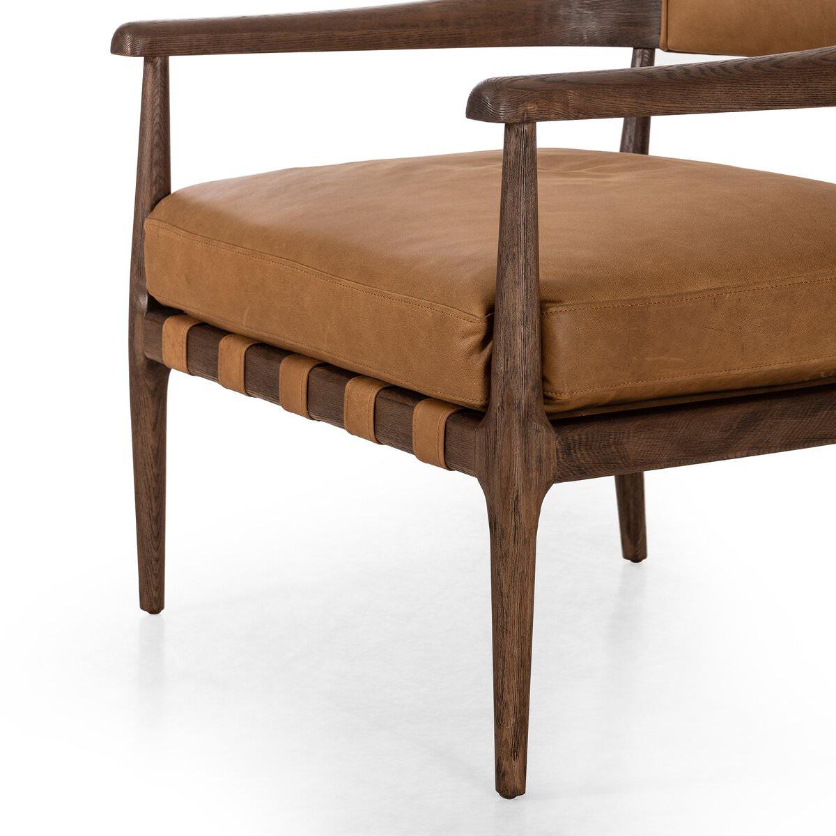 Close up of Four Hands Dane Chair in Eucapel Cognac on a white background