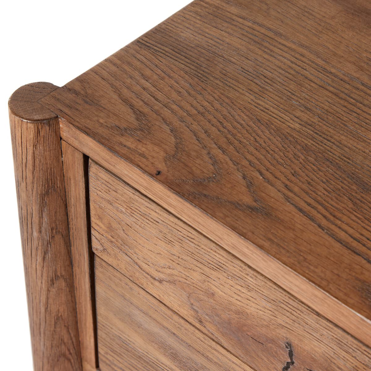 Close up of  Four Hands Glenview Desk in Weathered Oak Veneer on a white background