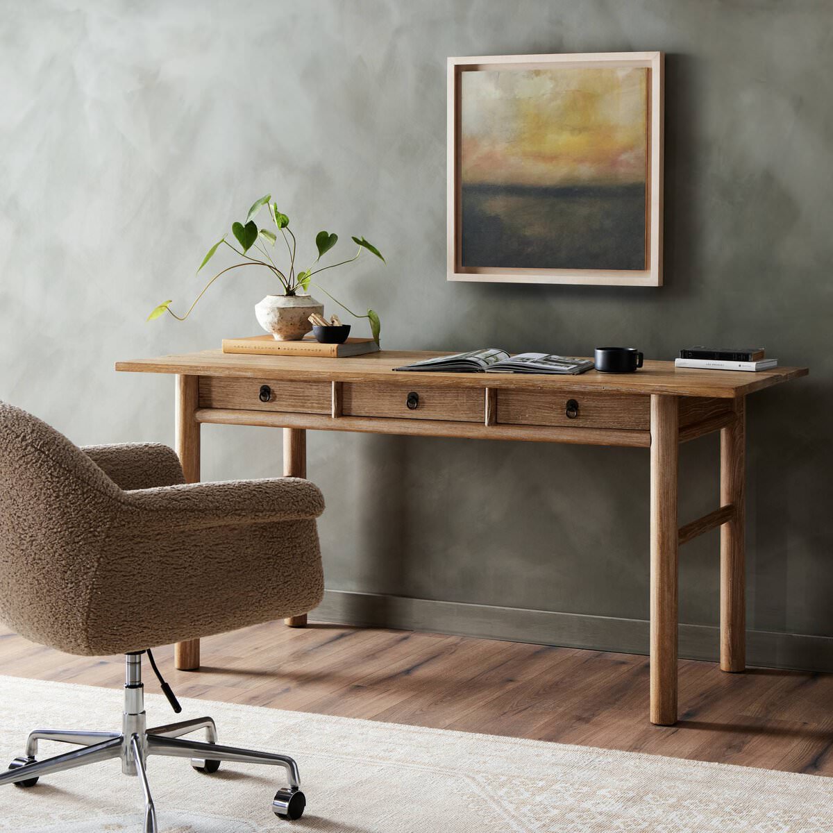 Four Hands Griffith Desk in Whitewash in a modern office with dark walls