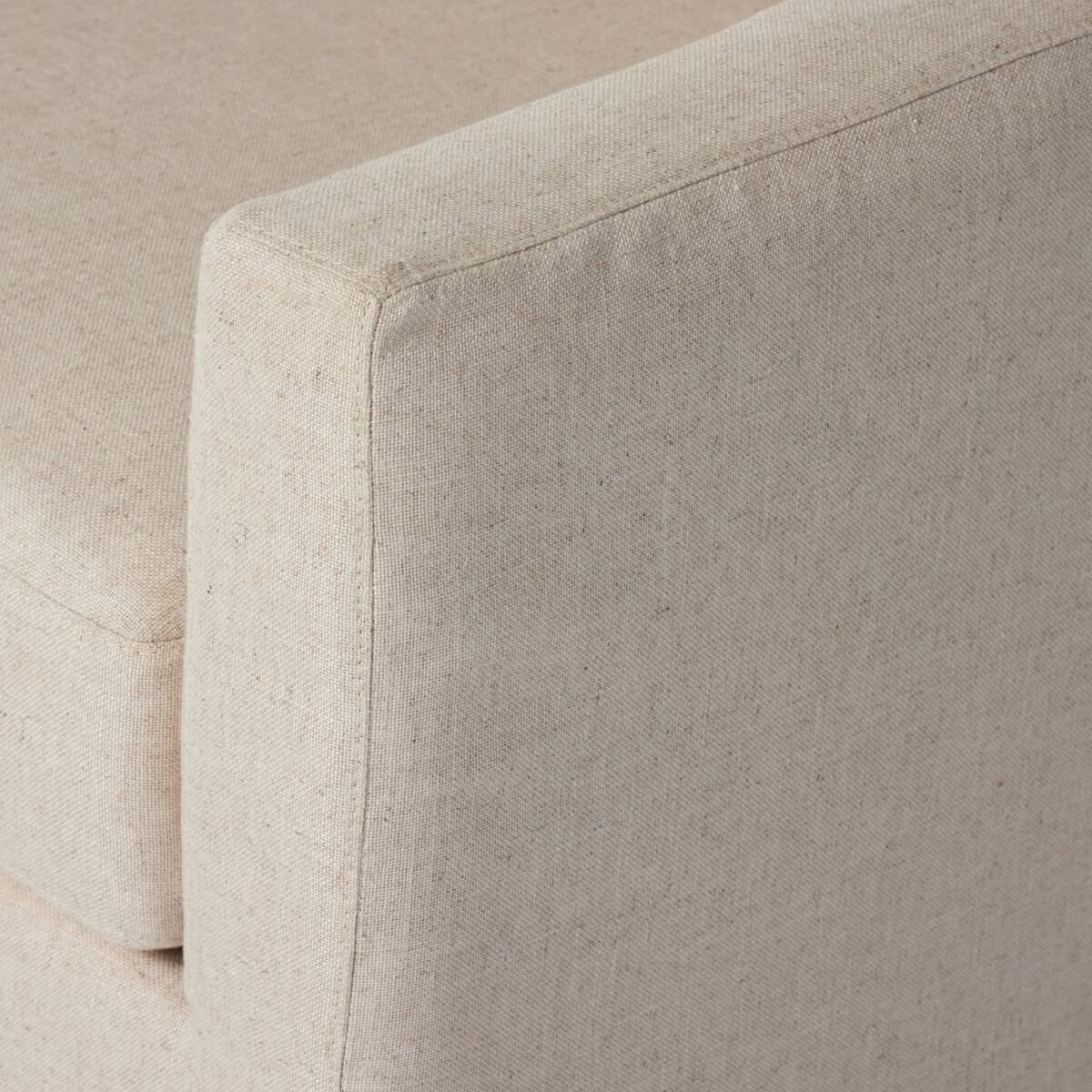 Close up of Four Hands Hampton Slipcover Swivel Chair in Evere Creme