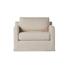 Four Hands Hampton Slipcover Swivel Chair in Evere Creme on a white background