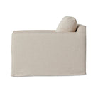 Four Hands Hampton Slipcover Swivel Chair in Evere Creme on a white background