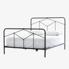 Four Hands Iron Casey Bed in Black on a white background