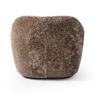 Back of Four Hands Julius Swivel Chair in Taupe Shearling on a white background