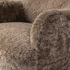 Close up of Four Hands Julius Swivel Chair in Taupe Shearling