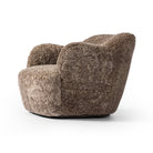 Four Hands Julius Swivel Chair in Taupe Shearling on a white background