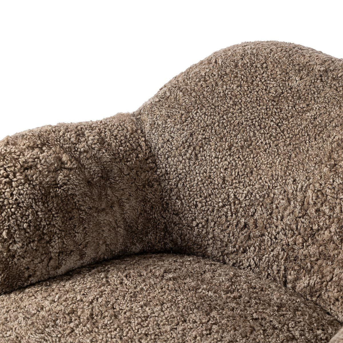 Close up of Four Hands Julius Swivel Chair in Taupe Shearling on a white background