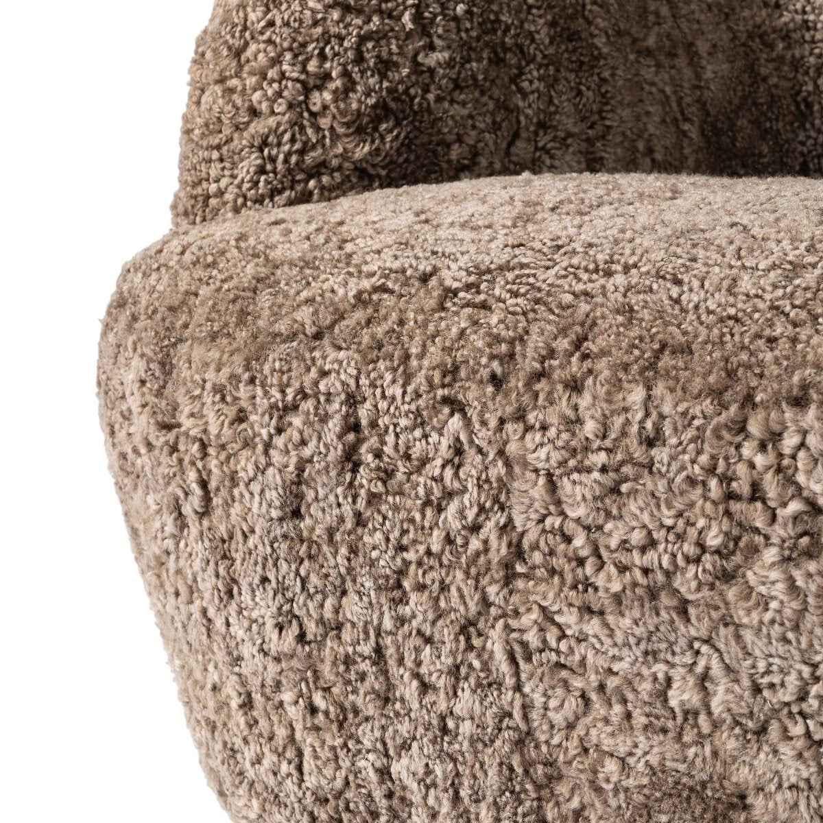 Close up of Four Hands Julius Swivel Chair in Taupe Shearling on a white background