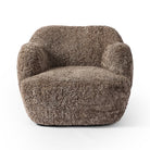 Four Hands Julius Swivel Chair in Taupe Shearling on a white background