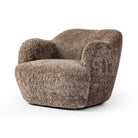 Four Hands Julius Swivel Chair in Taupe Shearling on a white background