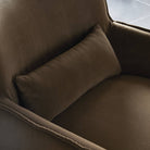 Close up of Four Hands Kimble Swivel Chair in Henry Coffee with grey floor  tiles in the background