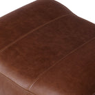 Close up of Four Hands Kylo Ottoman in Dulane Mahogany on a white background at Addison West