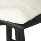 Close up of Four Hands Lewis Swivel Bar & Counter Stool in Cream Shorn Sheepskin on a white background at Addison West