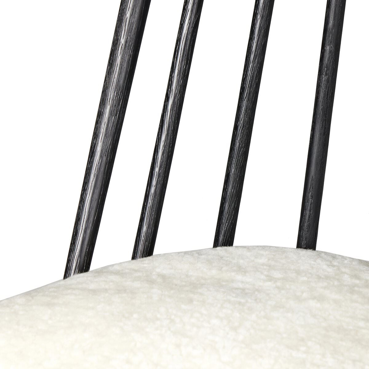 Close up of Four Hands Lewis Swivel Counter Stool in Cream Shorn Sheepskin on a white background at Addison West