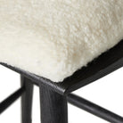 Close up of Four Hands Lewis Swivel Counter Stool in Cream Shorn Sheepskin  at Addison West