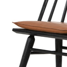 Four Hands Lewis Windsor Chair in Black Whiskey Saddle on a white background