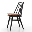 Four Hands Lewis Windsor Chair in Black Whiskey Saddle on a white background