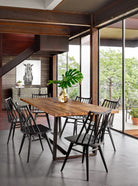 Four Hands Lewis Windsor Chair in Black oak in a modern dining room